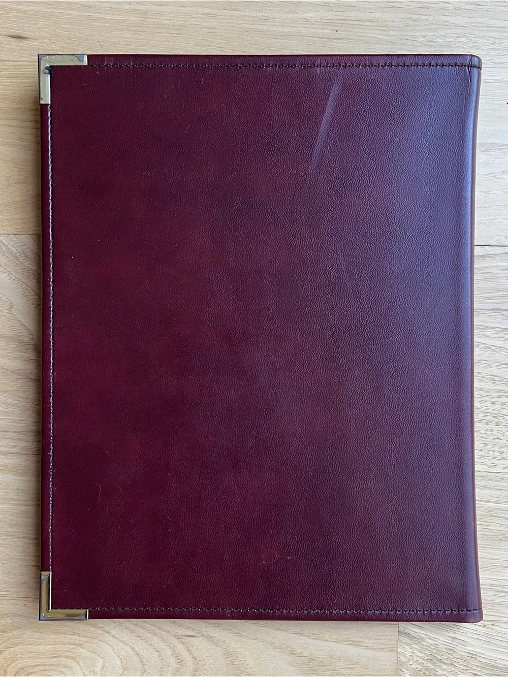 Embossed Burgundy Leather Portfolio with Gold Corners